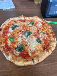 Lena Pizza and Bagels signature dishes Margherita PizzaThe Lena Bagel SandwichPepperoni Pizza